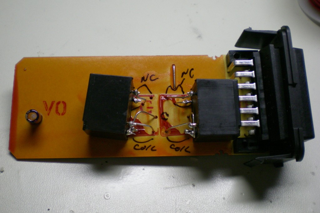 Both relays fastened in place.